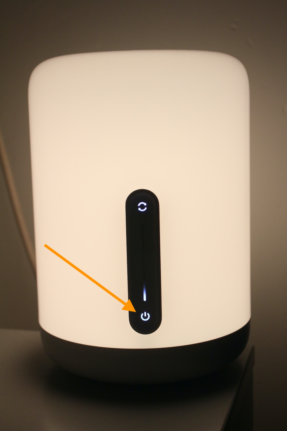 Front of the Xiaomi Mijia Bedside Lamp 2, highlighted power button